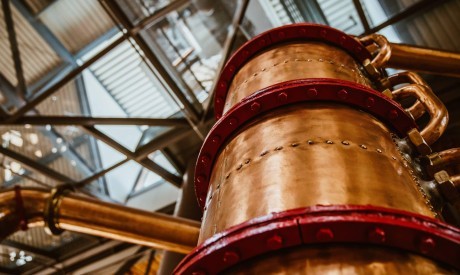 tall bronze barrel below skylight scaled